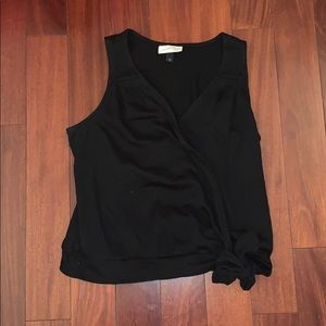 Black v neck with bow on left hip